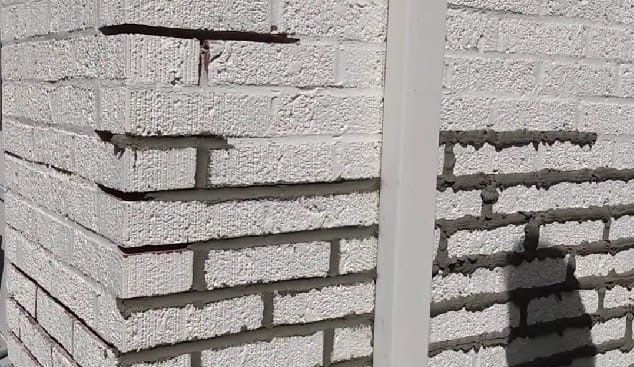 Brick tuckpointing with fresh mortar joints, completed in Atlanta