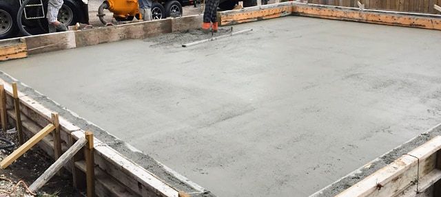 Foundation repair with reinforced concrete piers, completed in Atlanta