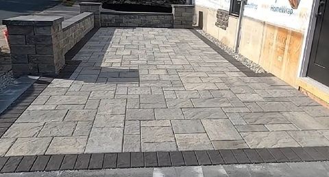Hardscaping patio installation with interlocking pavers, completed in Atlanta