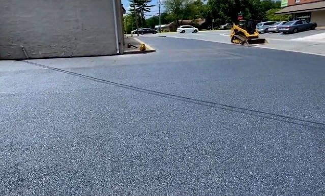 Hardscaping parking lot  paving with fresh asphalt completed in Atlanta
