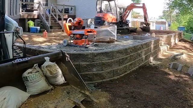Retaining wall construction with segmental concrete block, completed in Atlanta