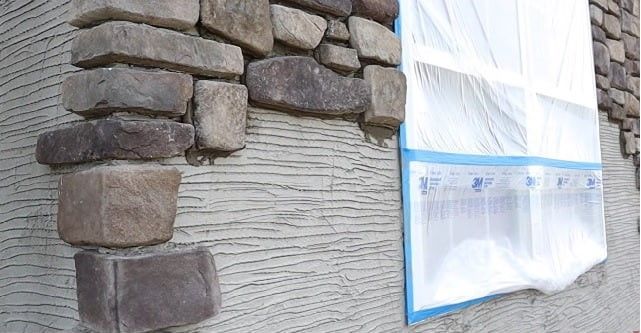 Stone masonry with natural fieldstone finish, completed in Atlanta
