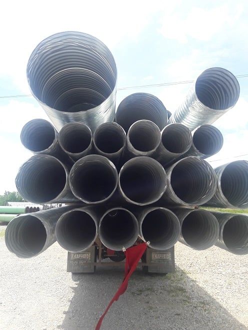 A bunch of pipes are stacked on top of each other — Odessa, MO — Continental Pipe Co.
