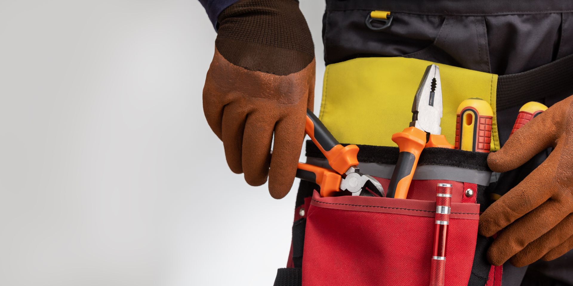 Close-up of tools belt on electrician worker. Close-up of tools belt on electrician worker.