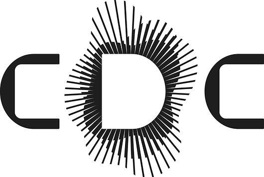 Black-and-white stylized C D C logo with a spiky circular design around the D