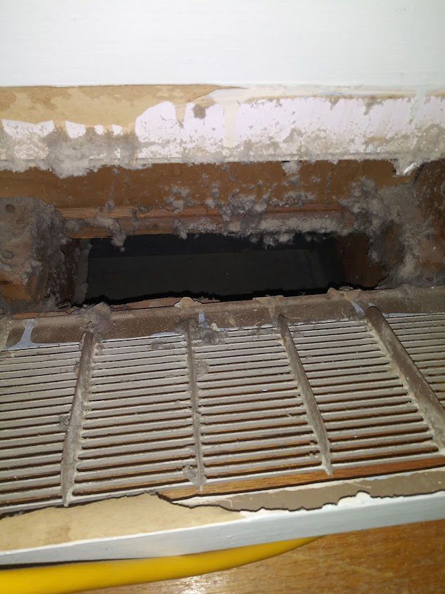 There is a hole in the wall that looks like a hole in the floor.