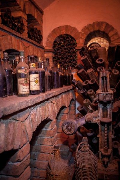 a shelf is filled with bottles