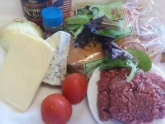 Ingredients for burgers: ground beef, buns, cheese, tomato, onion, lettuce, salt, and pepper.