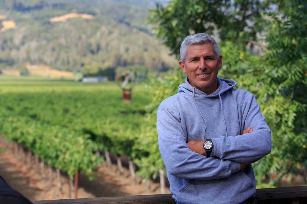Mike Morisoli with next generation in the vineyard.
