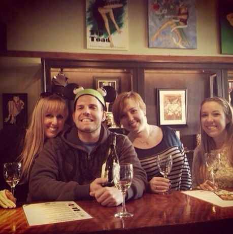 Group of friends enjoying wine tasting together