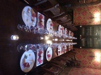 Elegant dining table with candles and wine glasses