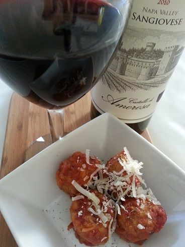 Italian style chicken meatballs served with wine