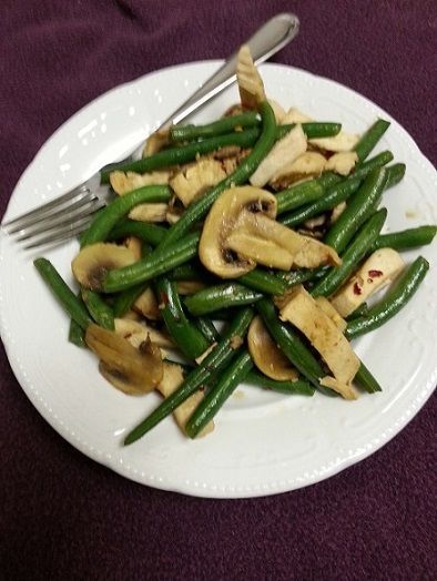 Stir fry vegetables and meat cooking
