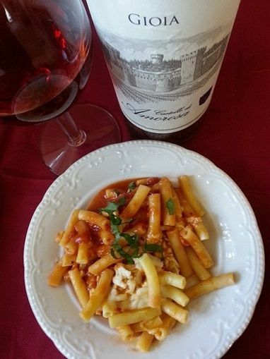 Pasta with marinara sauce and wine