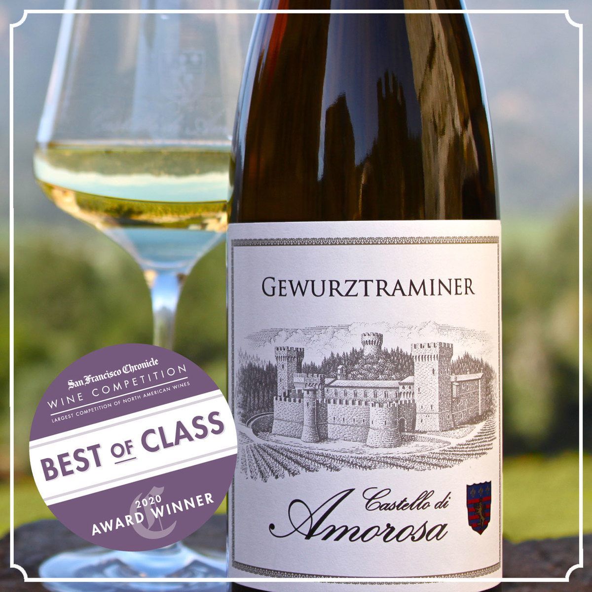 Bottle of Castello di Amorosa Gewürztraminer wine with glass and Best of Class award.