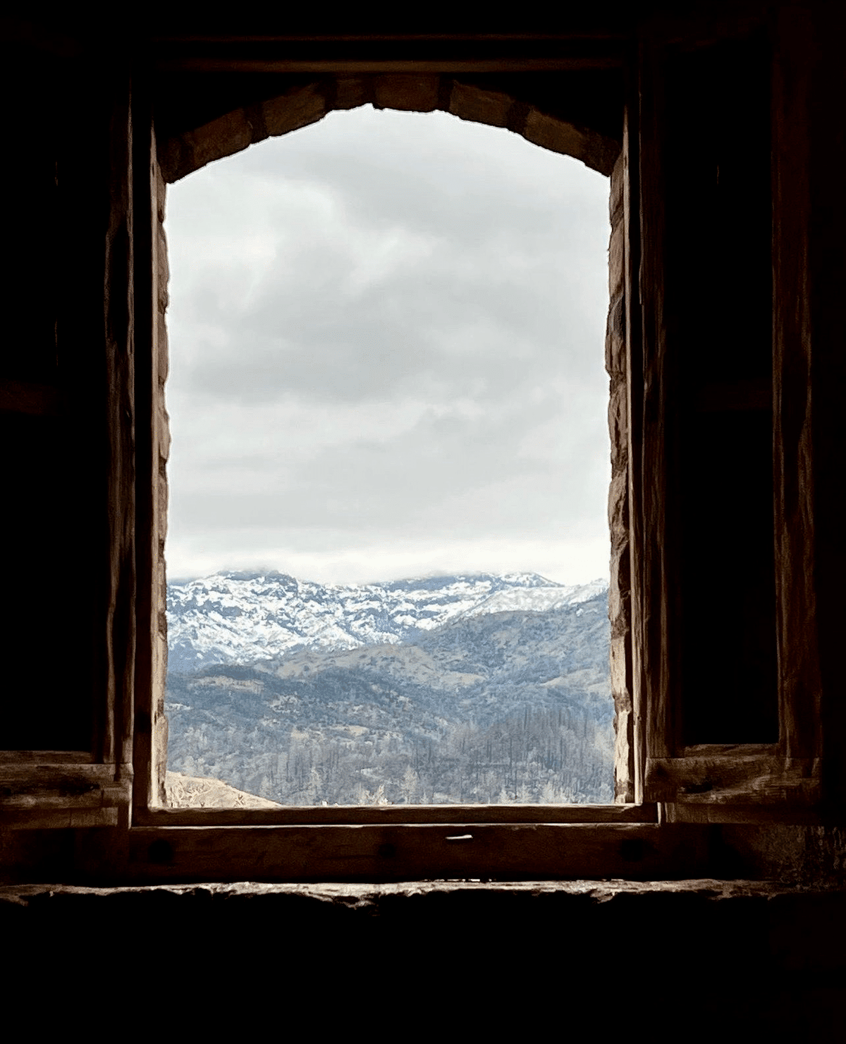Snow viewed through castle window
