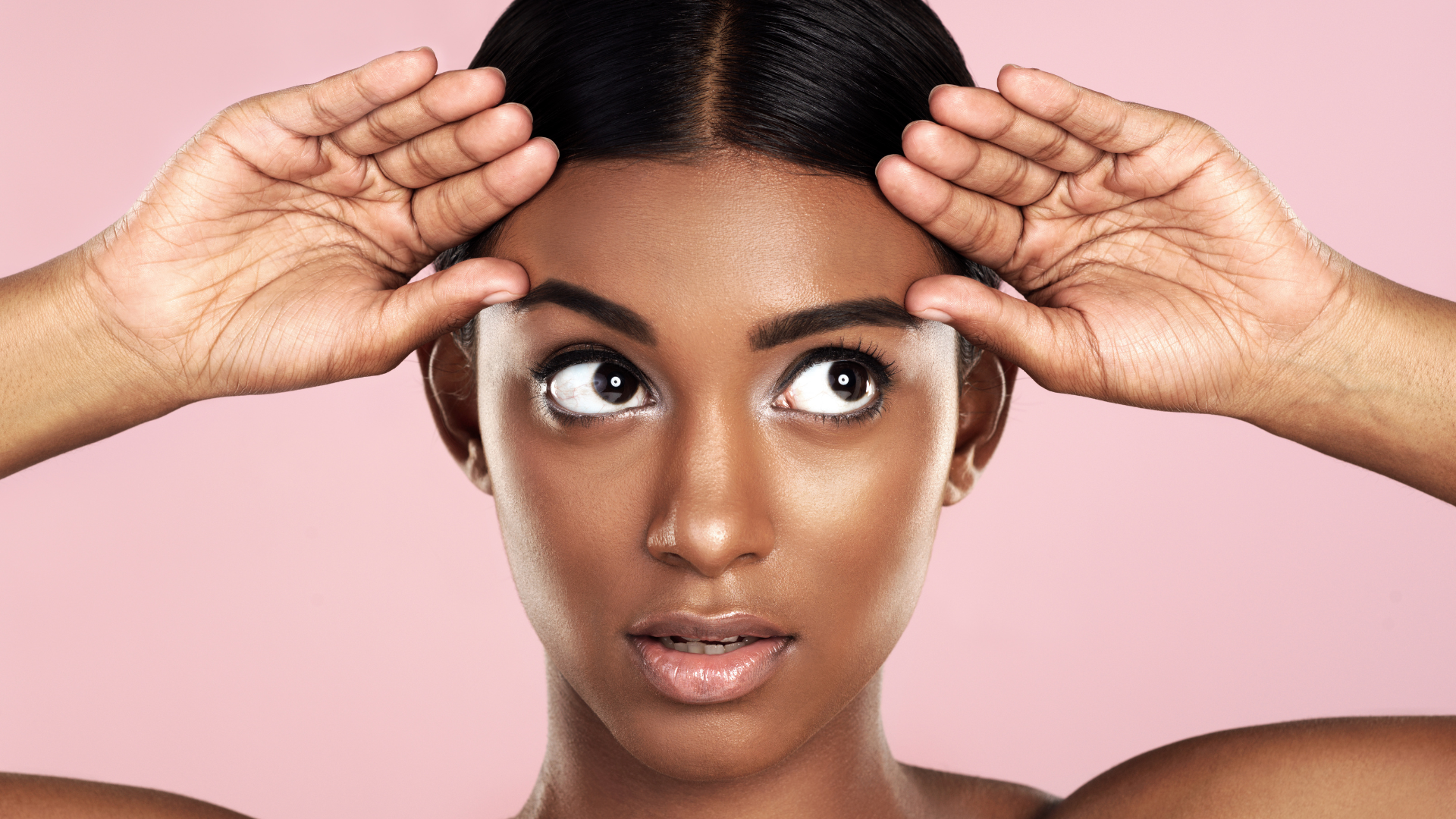 Woman looking at eyebrows, preparing for pdo thread lift