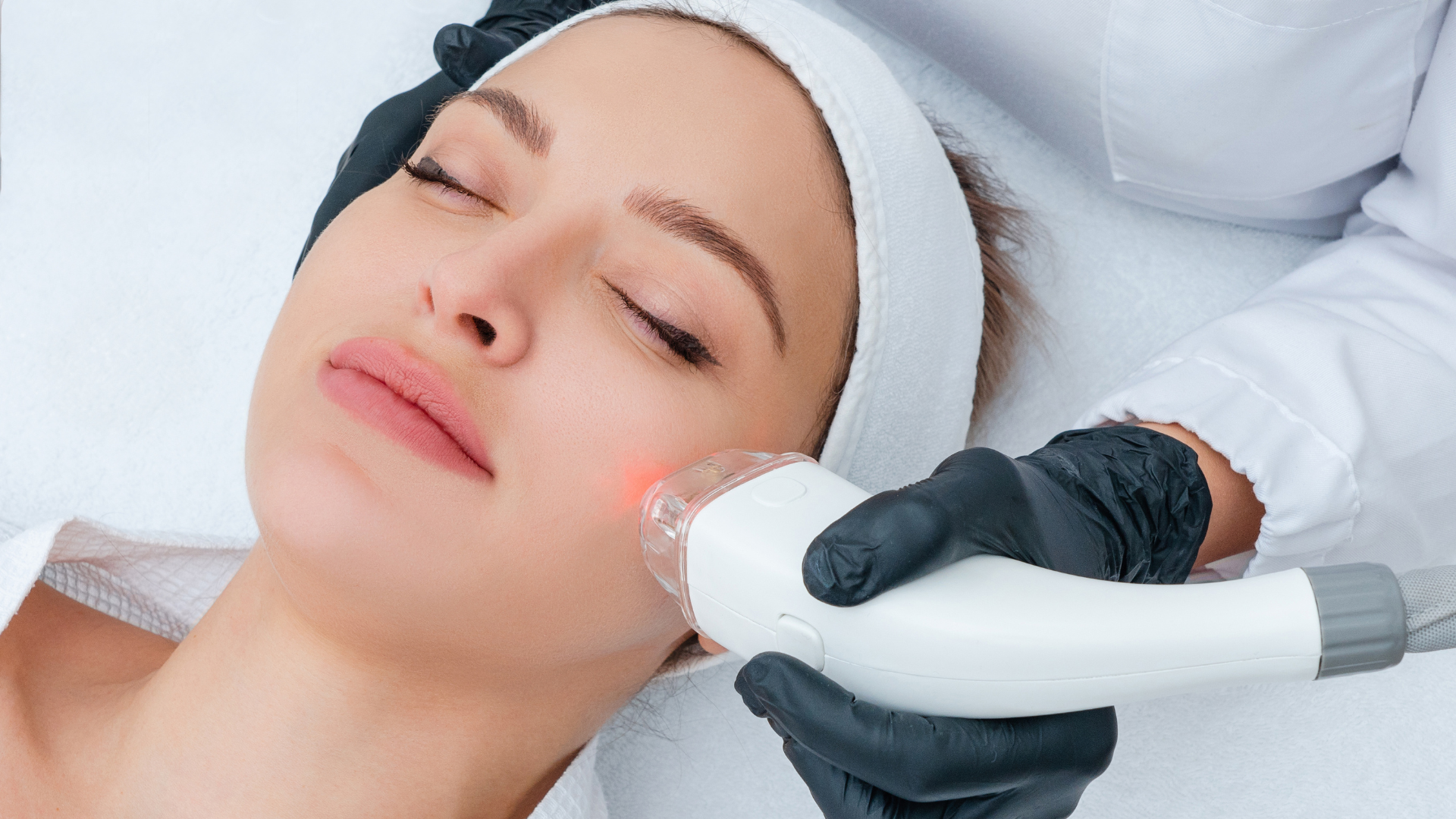 Woman getting skin tightening treatment