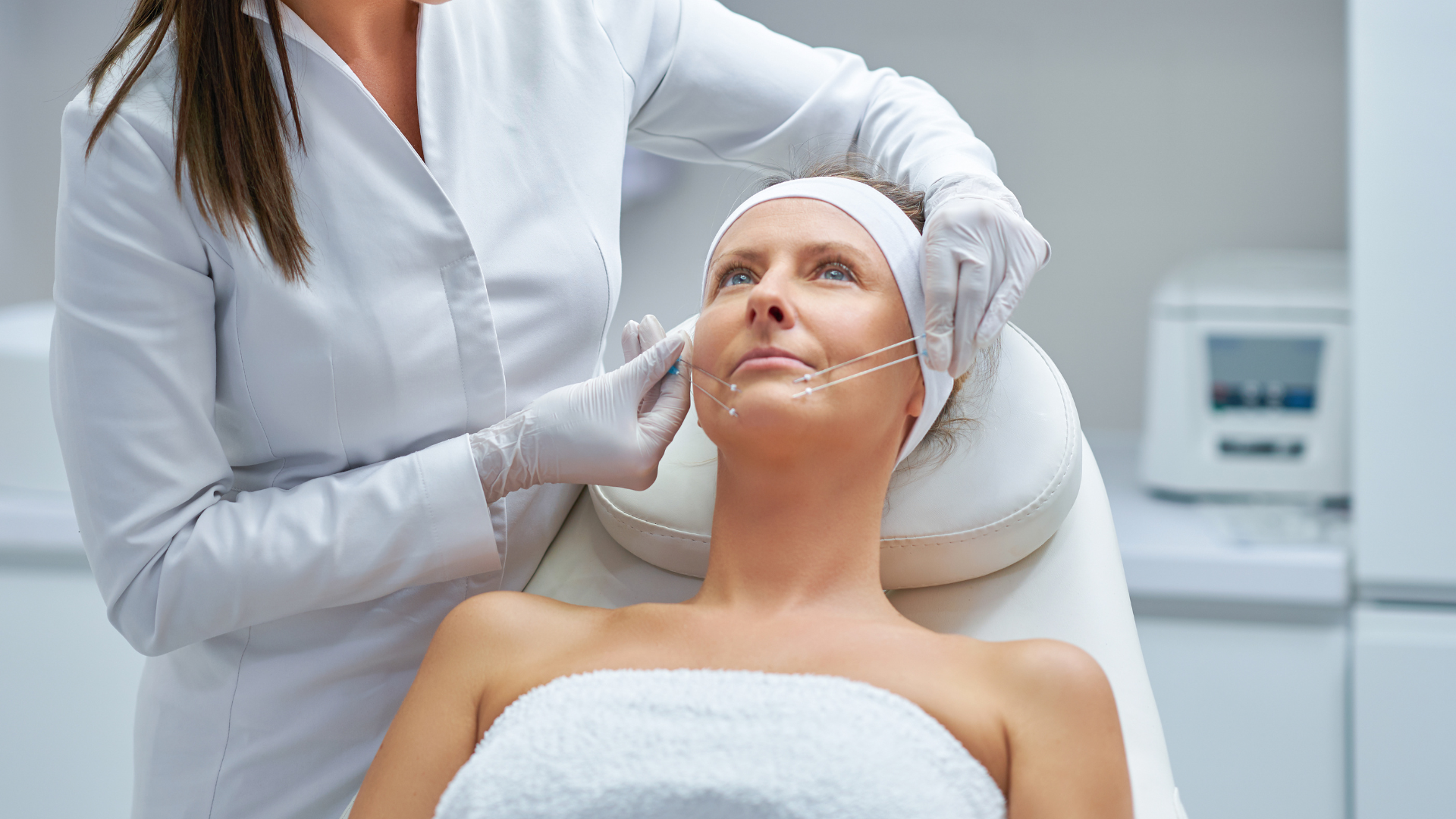 woman getting pdo threads on her face