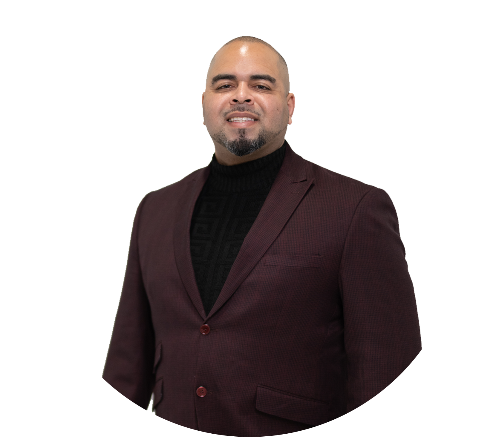 Portrait of a smiling man in a burgundy blazer and black turtleneck on a white background