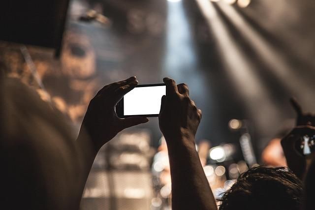 Professional event photographer capturing a corporate conference in Atlanta with keynote speakers, executive networking, and engaged attendees in a modern event venue.