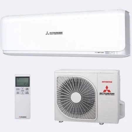 ChatGPT said:
Technician removing a filter from a wall-mounted air conditioner during maintenance with the front cover open.