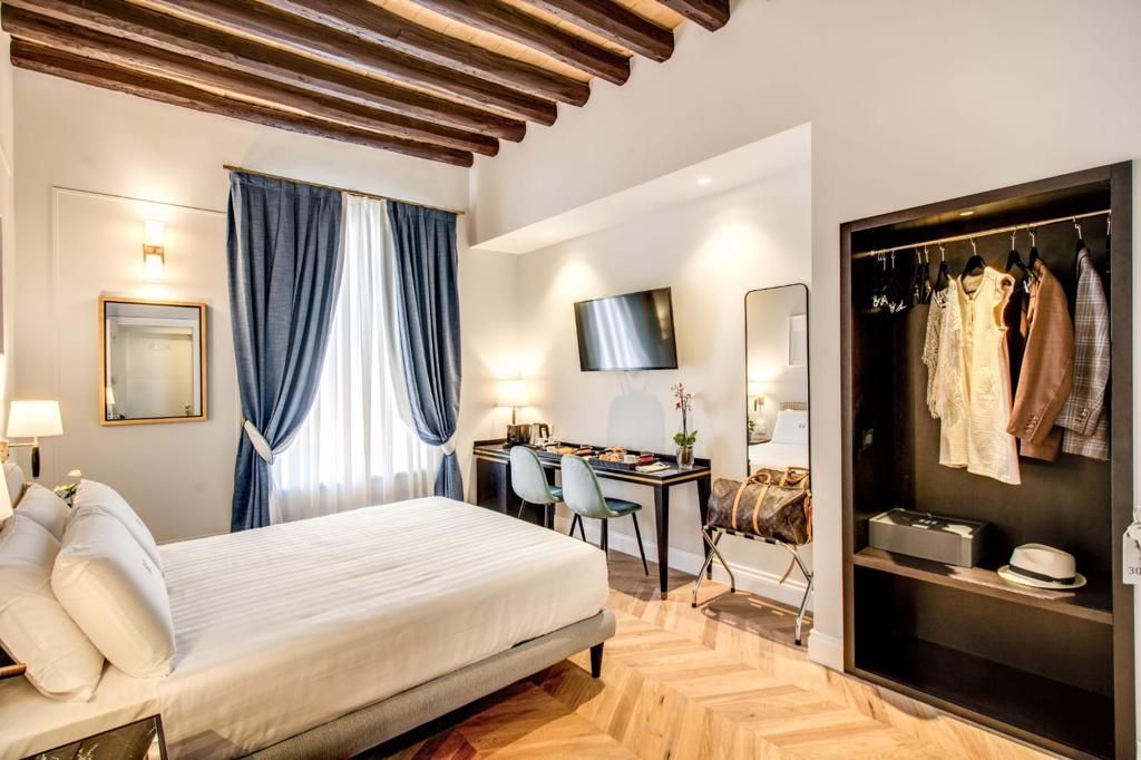 progettazione di interni con letto bianco