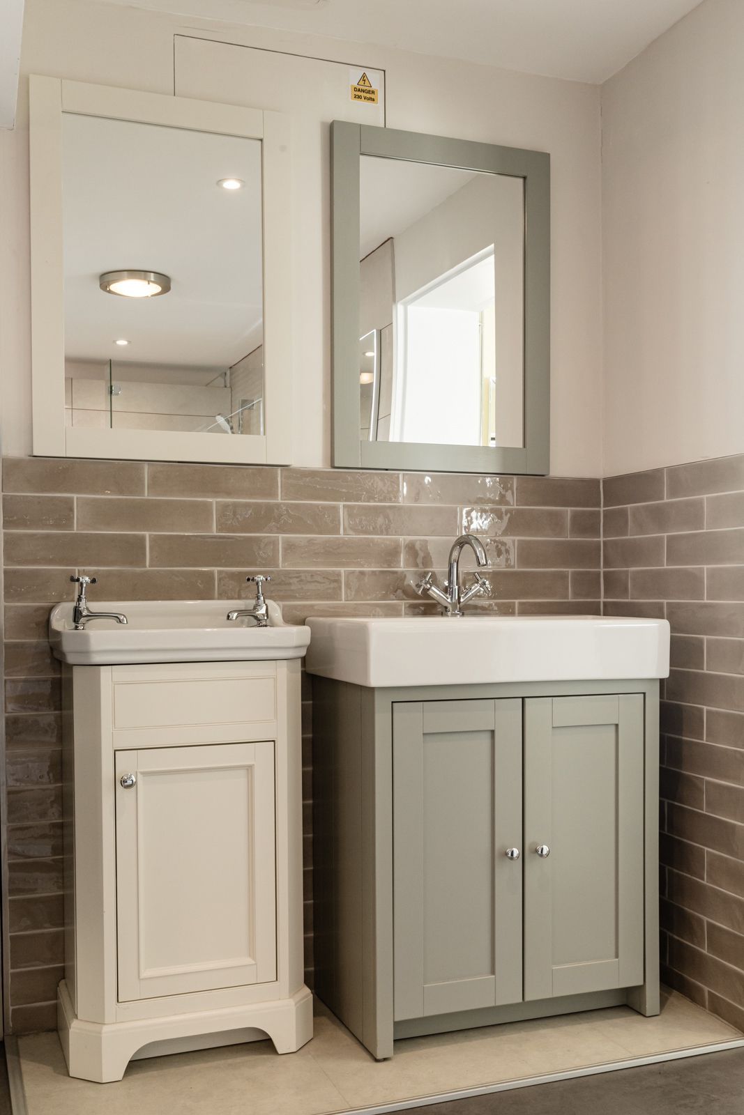 There is a sink and a mirror in the bathroom.