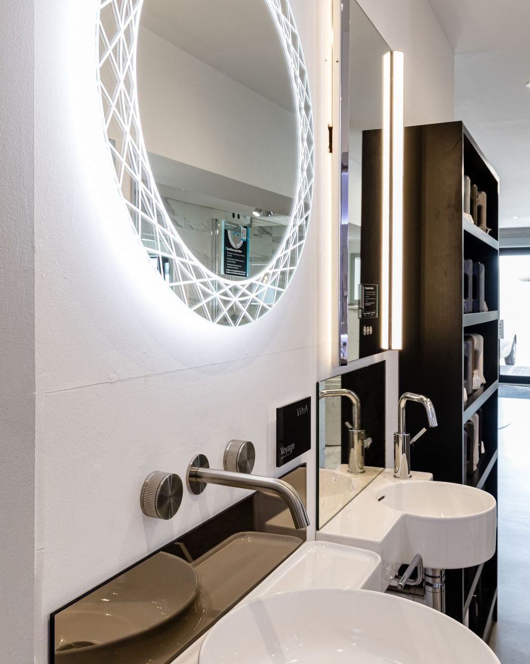 A bathroom with two sinks and a mirror with the number 1 on it