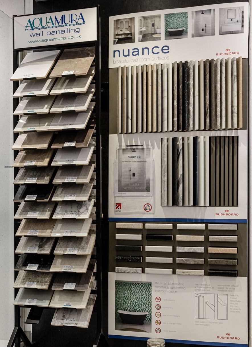 A display of tiles and a sign that says nuance