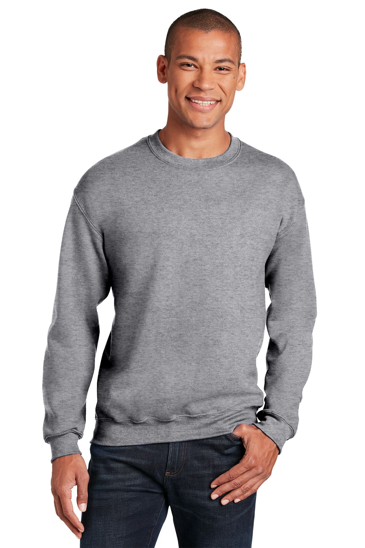 A man is wearing a grey sweatshirt and jeans.