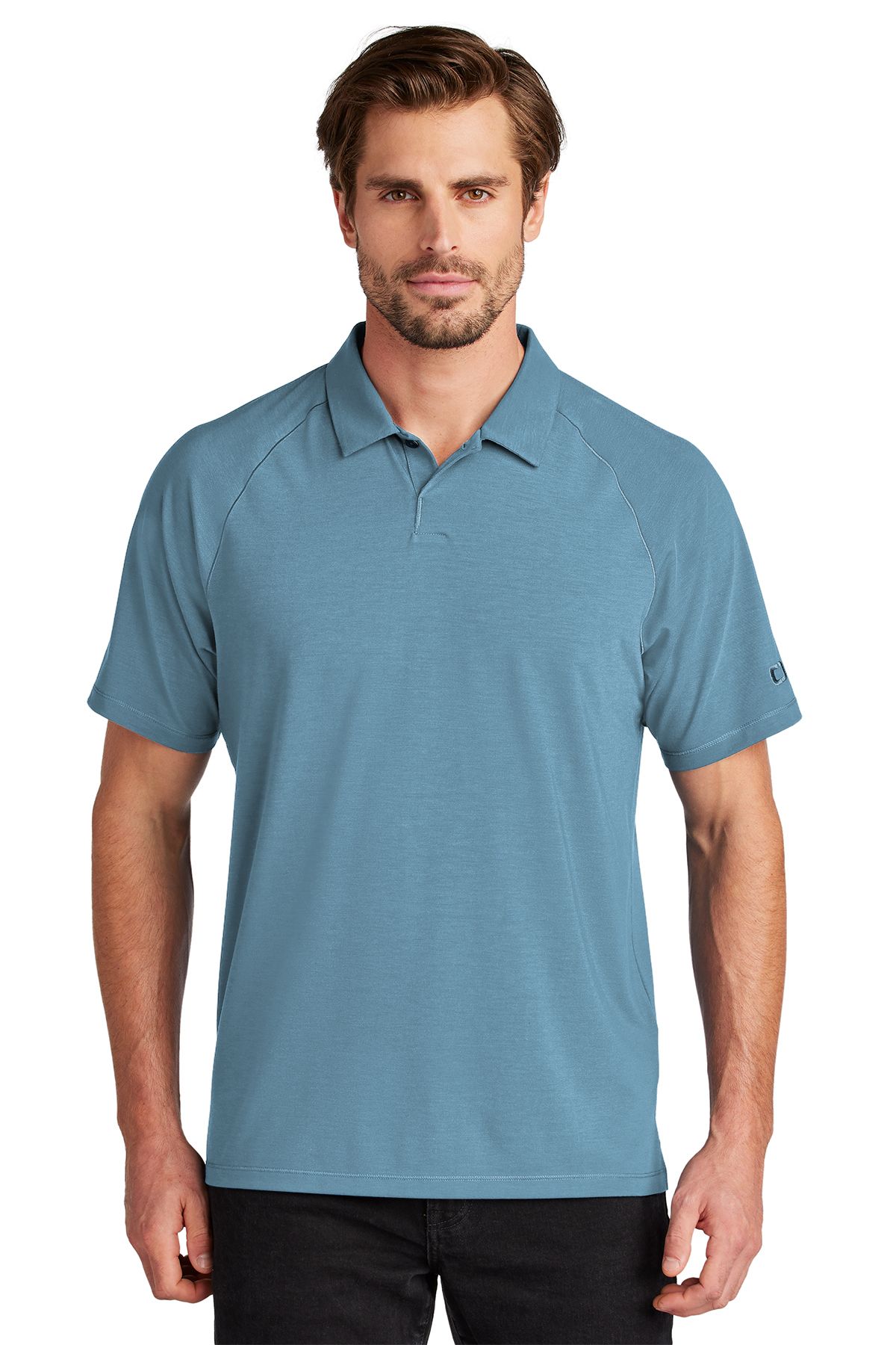 A man is wearing a blue polo shirt and black pants.
