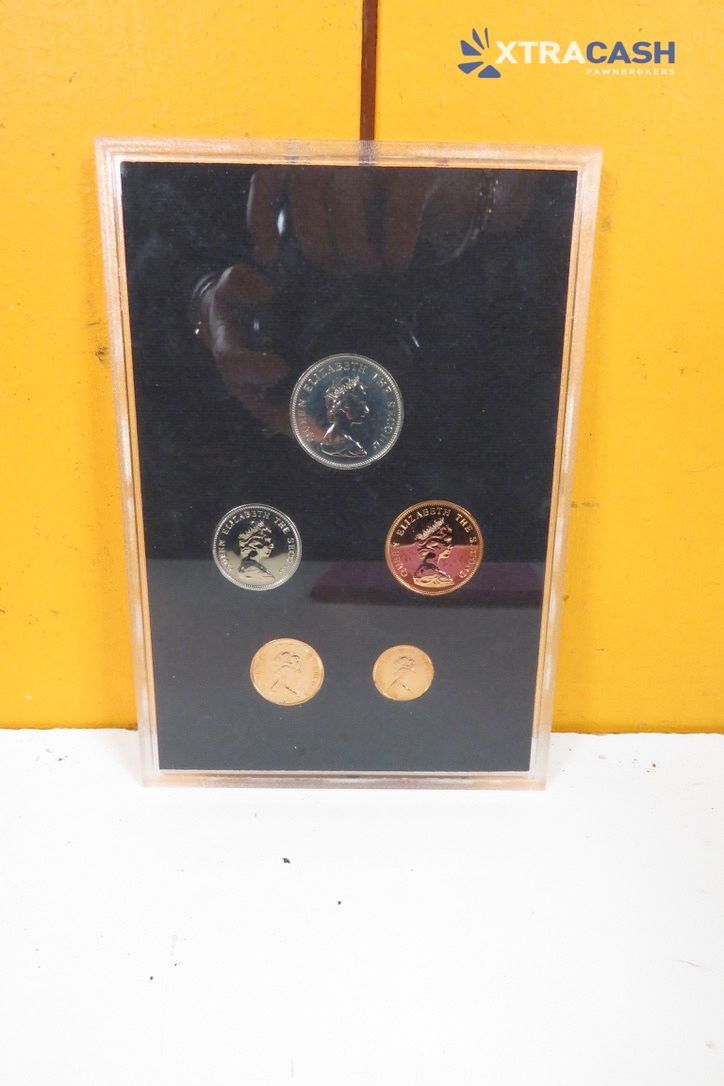 Falkland Islands 1974 coin set on a black display card, with five coins arranged vertically.