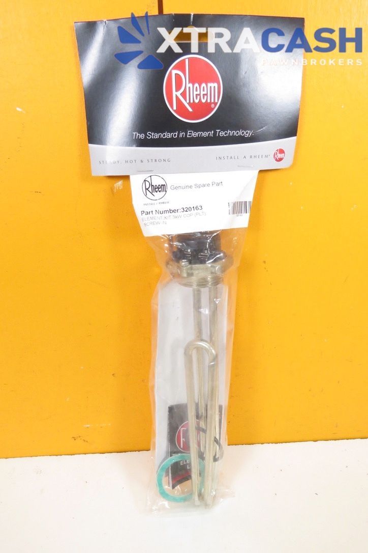 Rheem XtraCash water heater part in clear packaging against a yellow wall