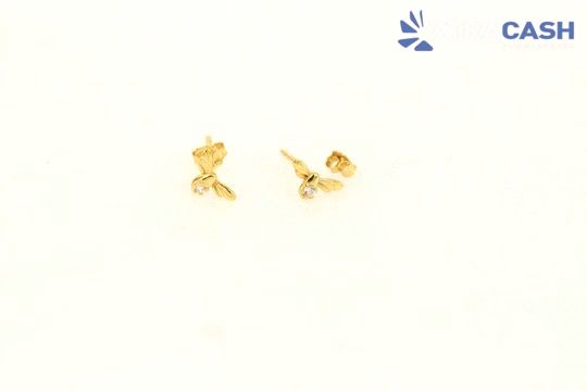 Two small gold earrings on a white background with a CASH logo in the top right.