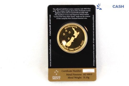 Black gold bar package labeled “PATRON FRANKLIN GOLD KITT” with a gold cat emblem and “CASH” text on white background