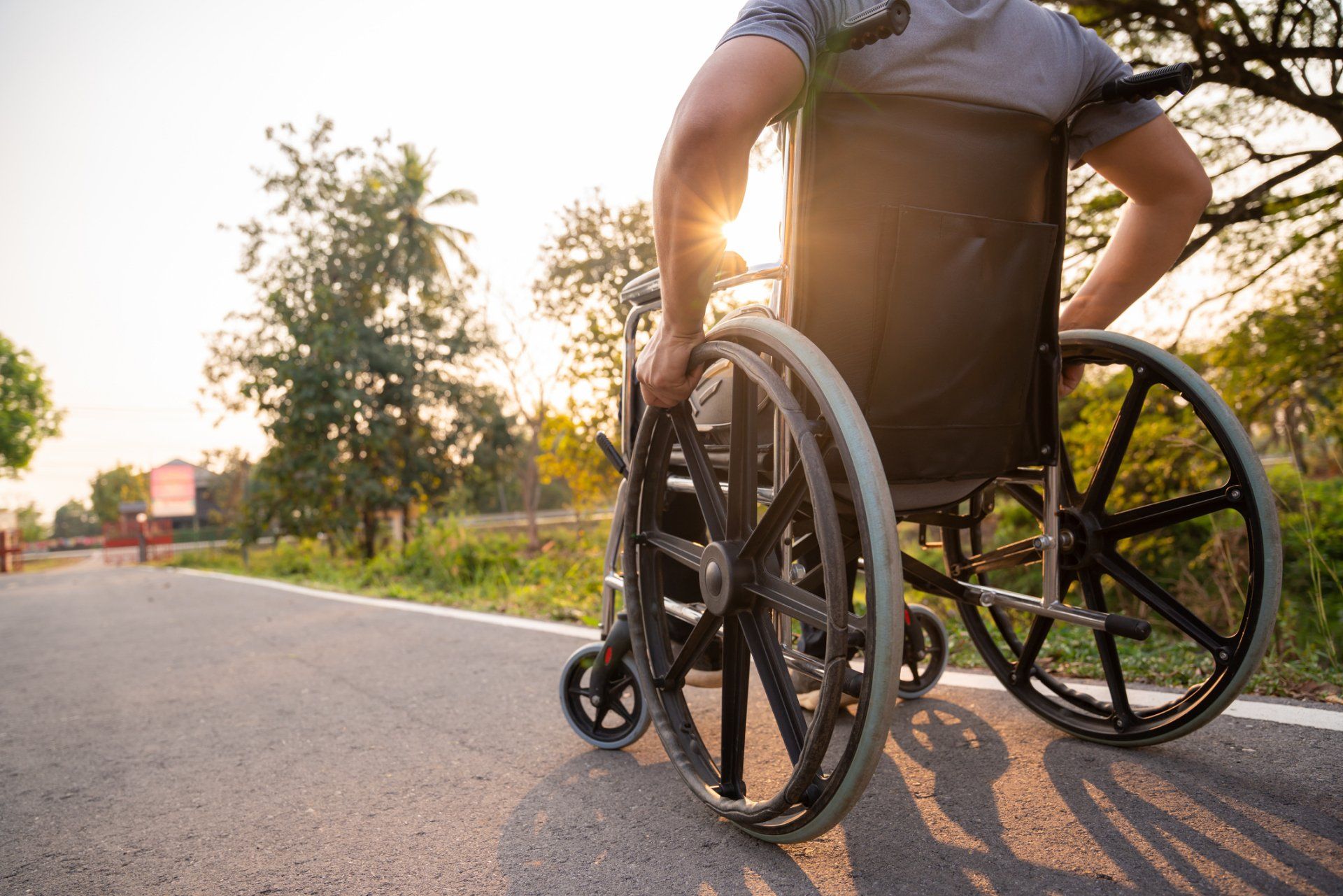 Man on a Wheelchair — Miramar, FL — Angelet’s Non-Emergency Wheelchair Transport Man on a Wheelchair — Miramar, FL — Angelet’s Non-Emergency Wheelchair Transport