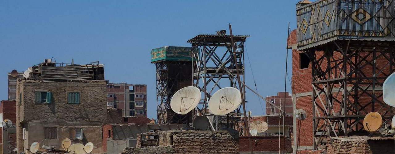Rooftops fitted with different TV systems