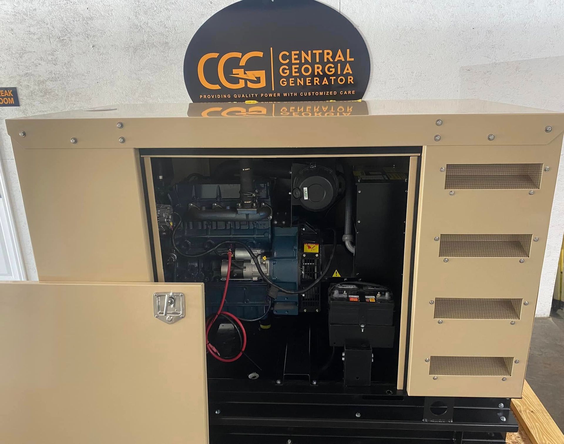 Diesel generator with open access panel showing internal components for inspection.
