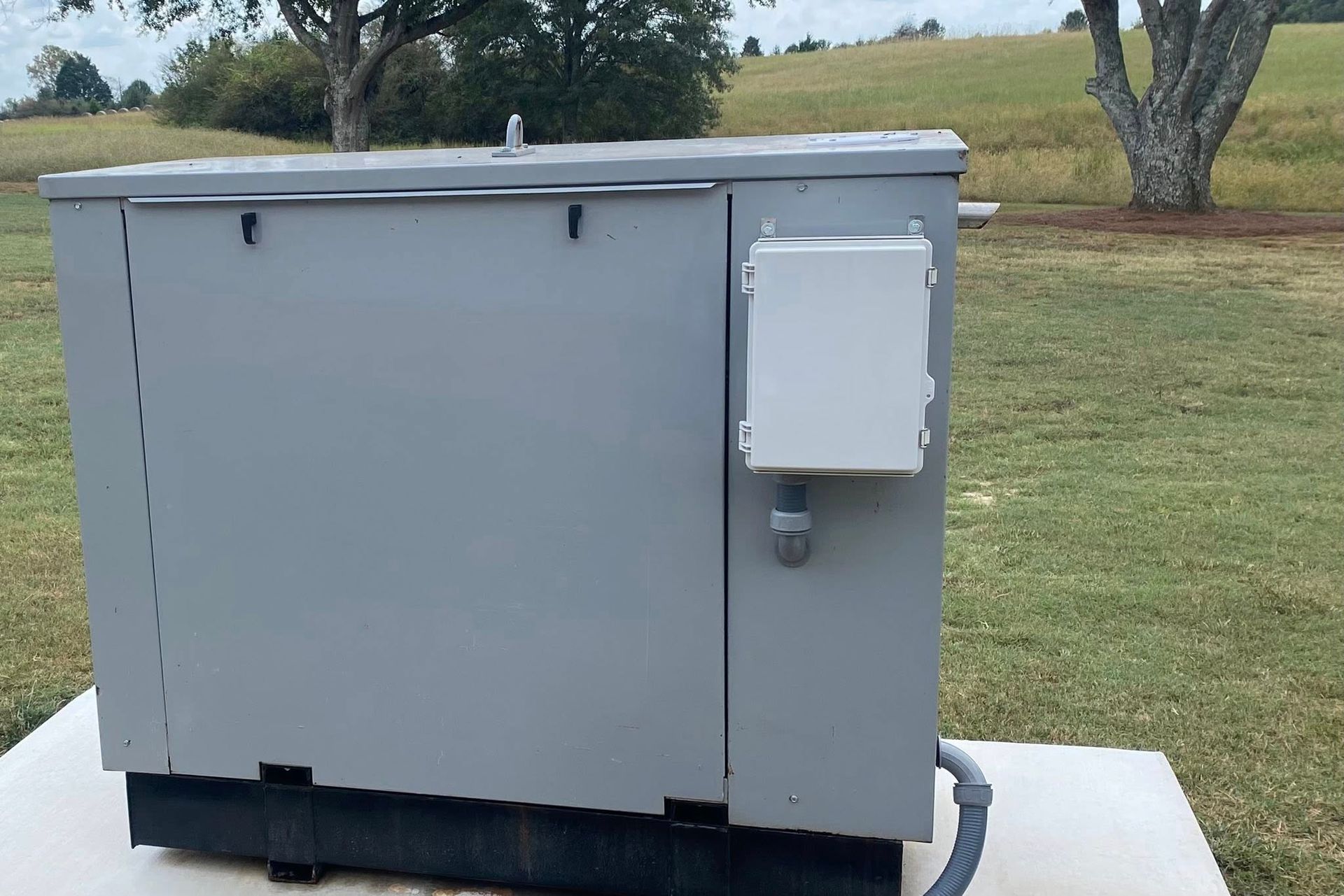 Diesel generator installed outdoors during summer, highlighting proper maintenance.