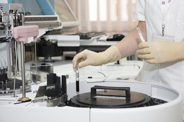 laboratory person doing tests