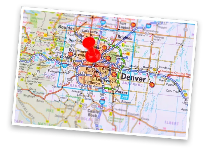 A red pushpin marks a location on a road map of the Denver, Colorado metropolitan area.