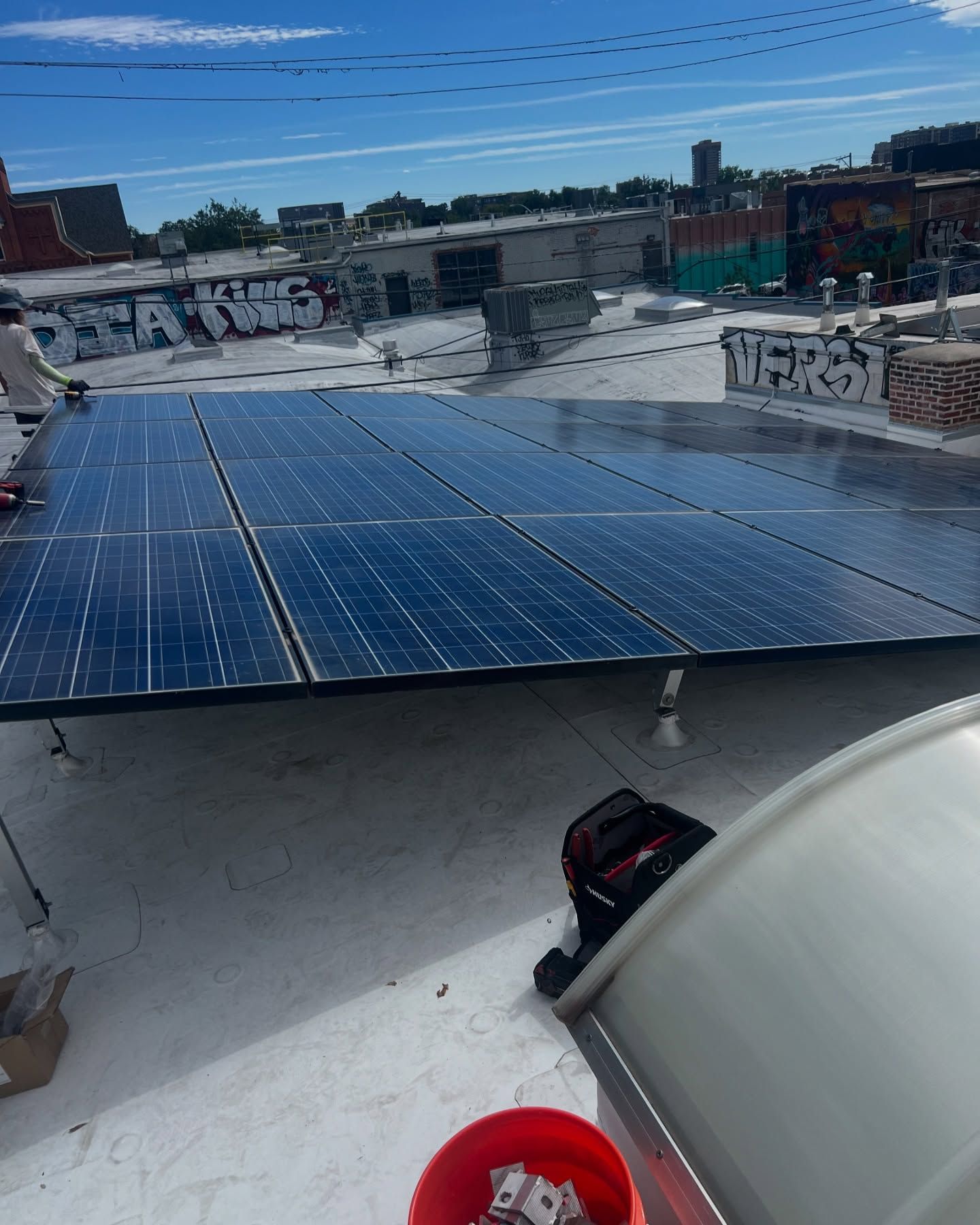 A roof with a lot of solar panels on it