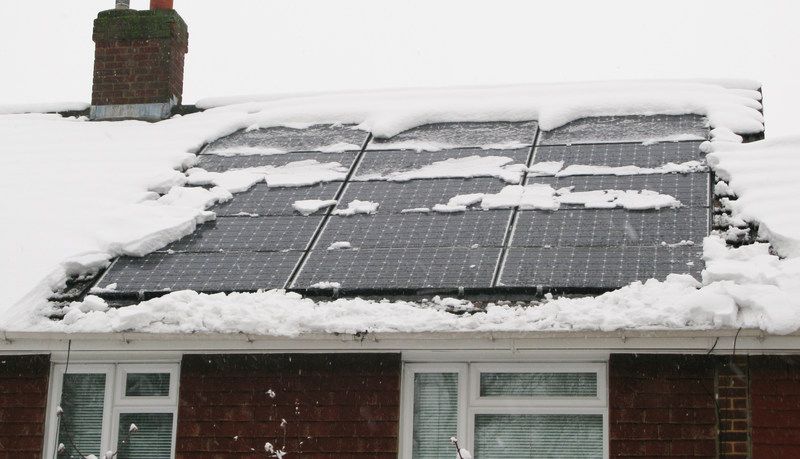snow on solar panel