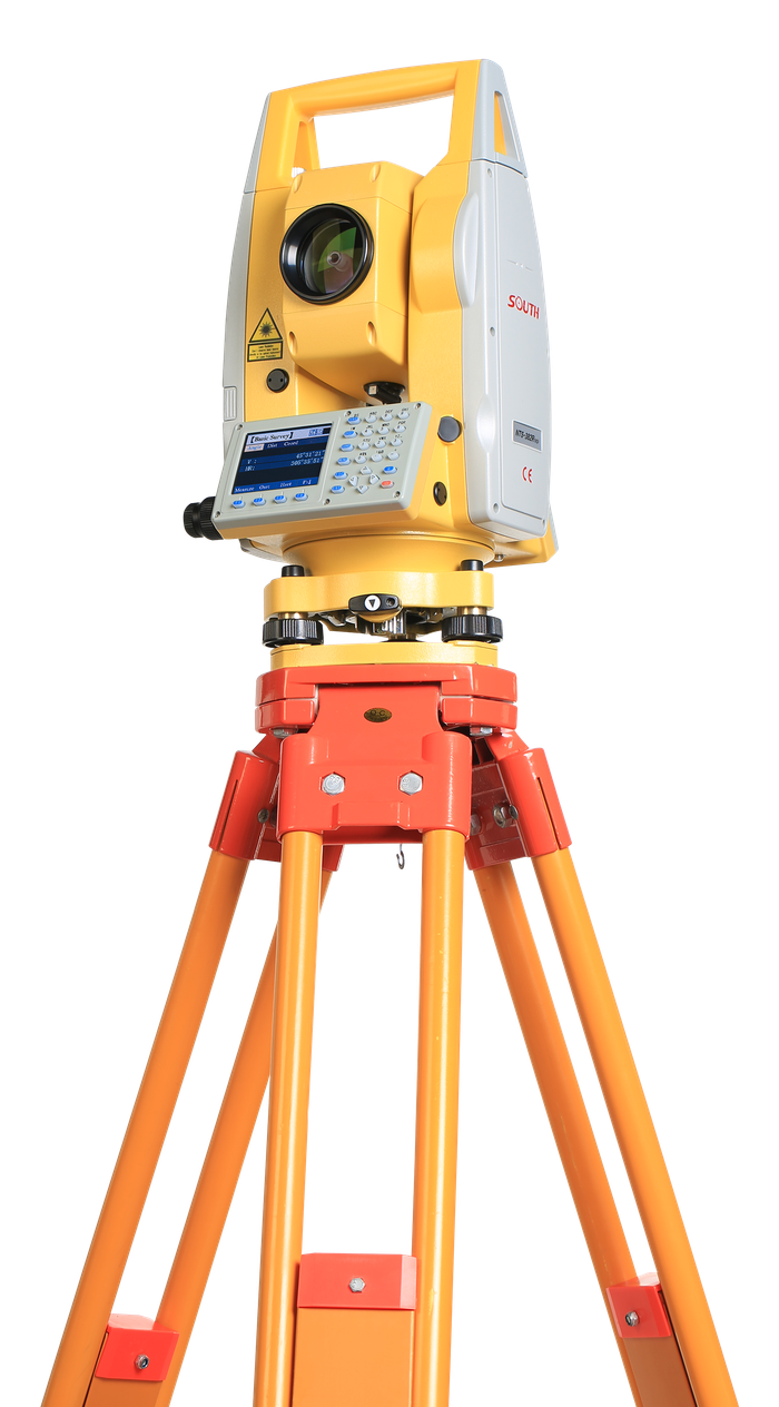 A yellow and silver theodolite on a tripod on a white background.