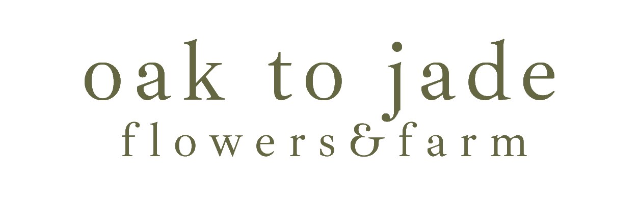 Oak to Jade flowers & farm logo with an acorn and floral line art on a pale background