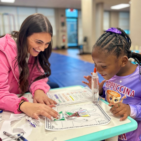 Pediatric Occupational Therapist with child