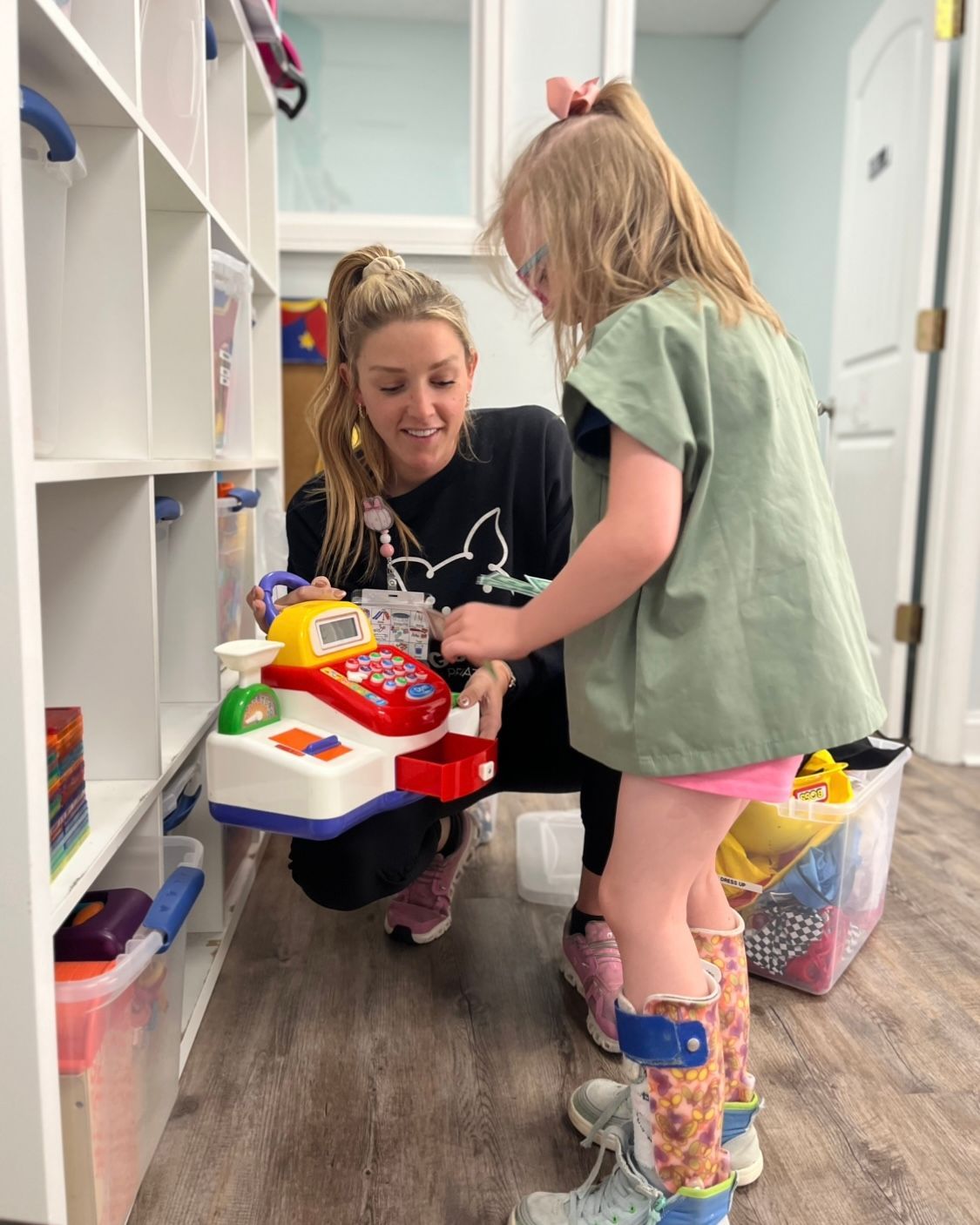 pediatric physical therapist and child