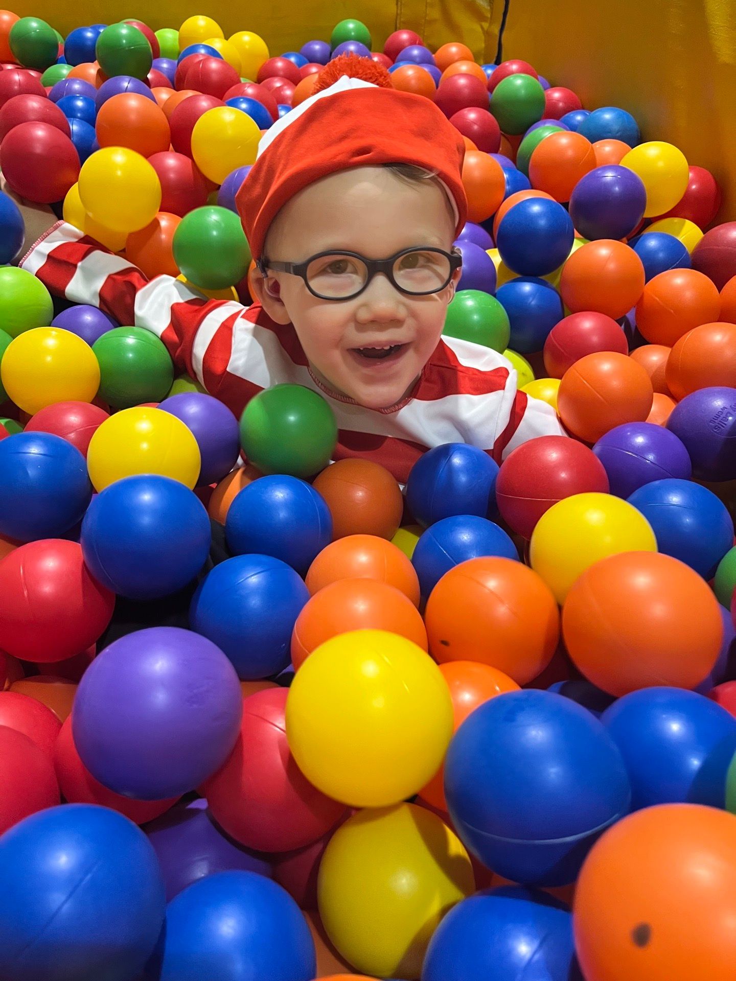 boy in ball pit 