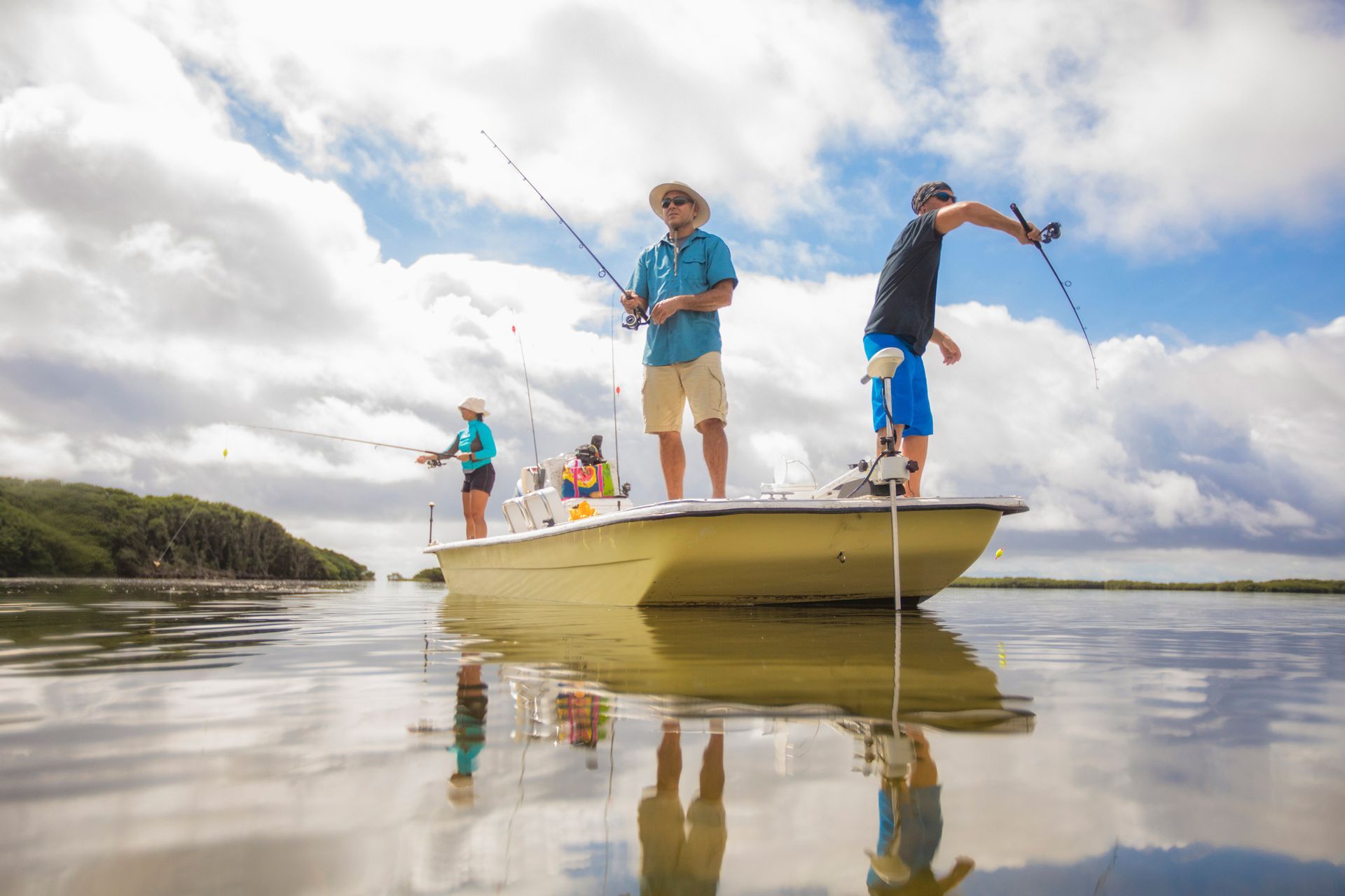 Men Fishing in the Gulf of Mexico — Bokeelia, FL — TowBoatUS Charlotte Harbor Men Fishing in the Gulf of Mexico — Bokeelia, FL — TowBoatUS Charlotte Harbor